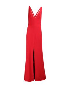 Long Tailored Dress With Clean Lines Embellished With A V-neck And Front Slit