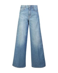 These Wide-leg Jeans By Stella Mccartney With Logo Printed On The Sides Are Produced In Italy, Always Following The Ethics Of Sustainability