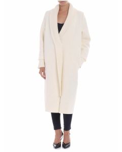 Cream-colored coat with knitted edges