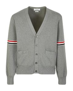 This Cardigan From Thom Browne Featuring The Label's Signature 4-bar Design At The Arm And A Classic Silhouette.