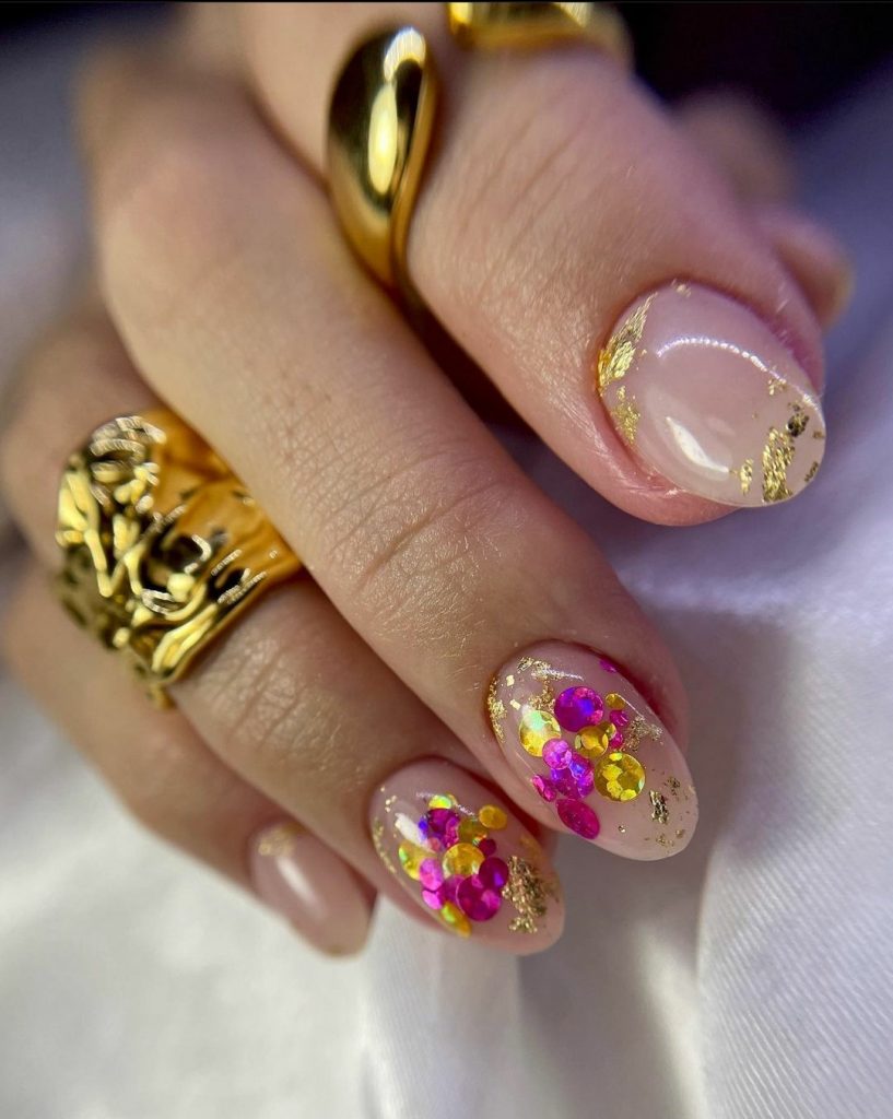 Gold foil and glitter nails with rhinestones 