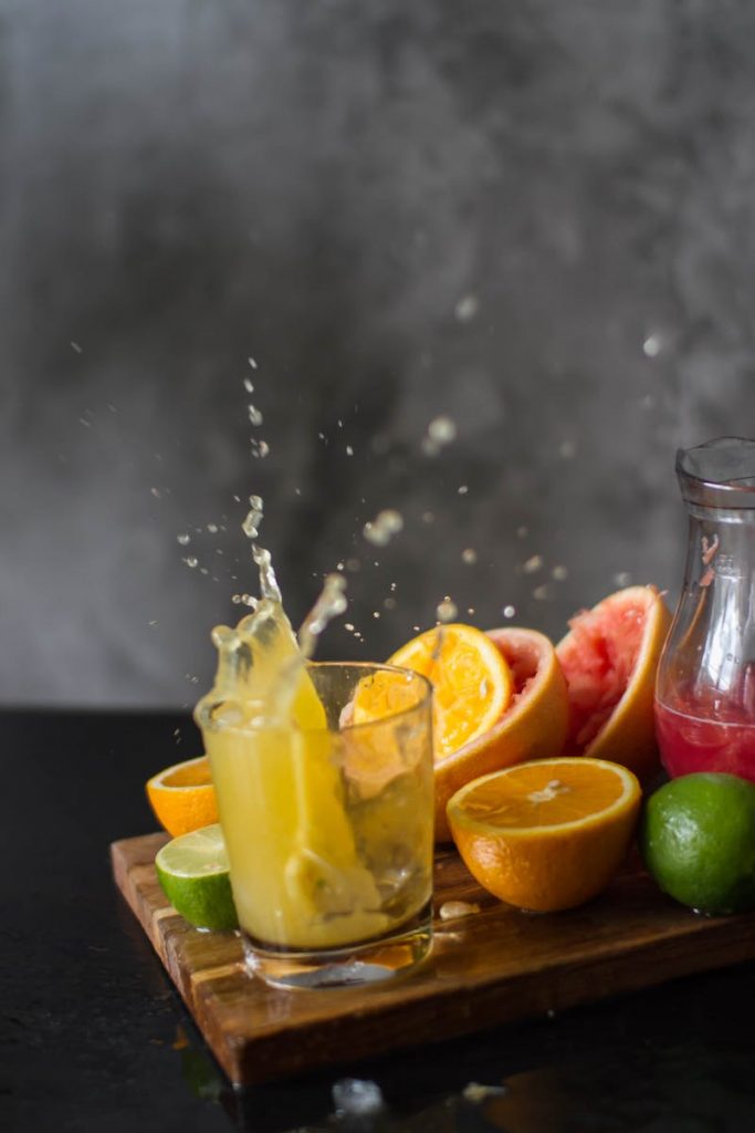 fruit juice splashing from a glass