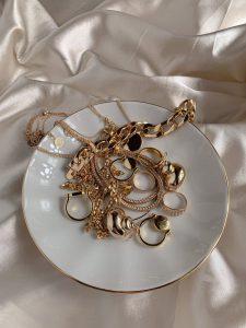 gold jewelry on plate