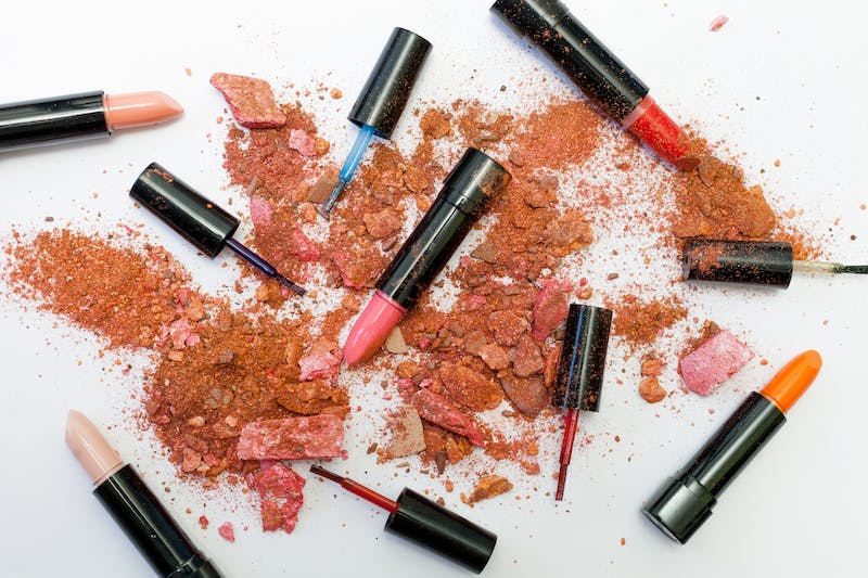 scattered makeup products