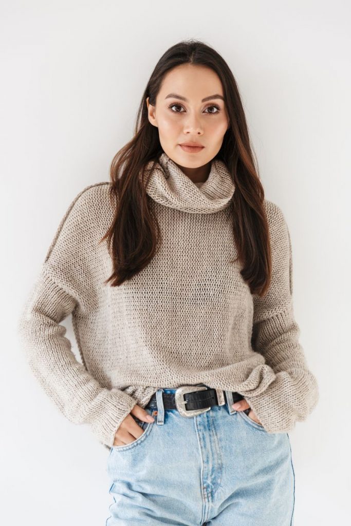 woman in a neutral sweater
