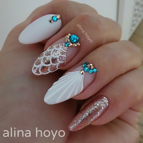mermaid nails look super cute. 
