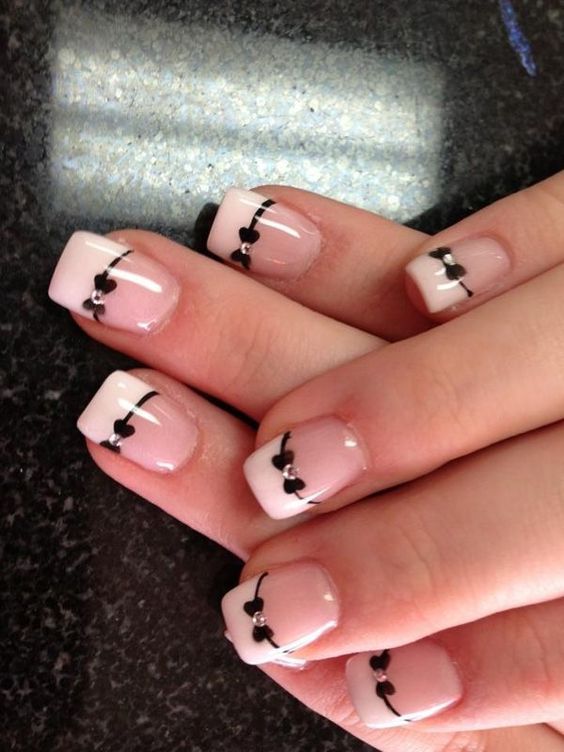 Whimsical French nails for joyful and unique teenage flair.