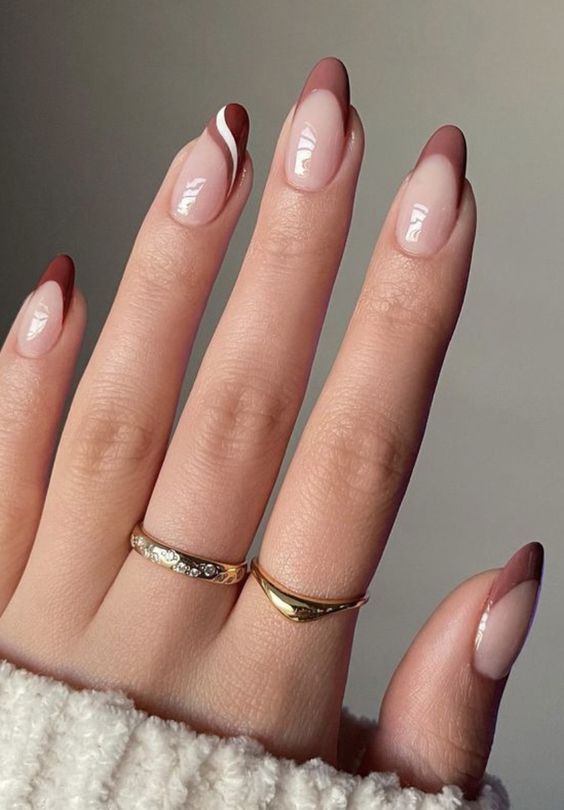 Fall-perfect elegance: chocolate-toned beauty meets timeless French manicure.