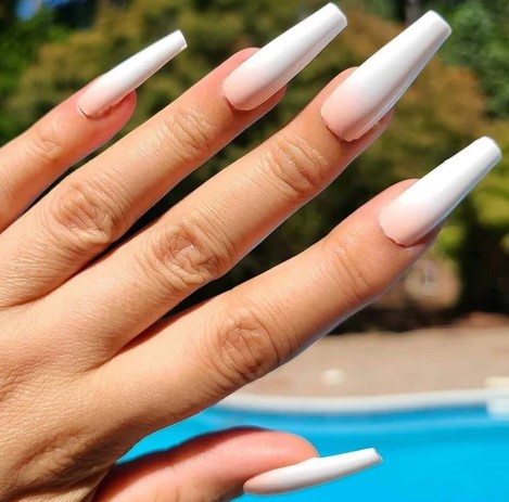Beige and nude ombre nails.