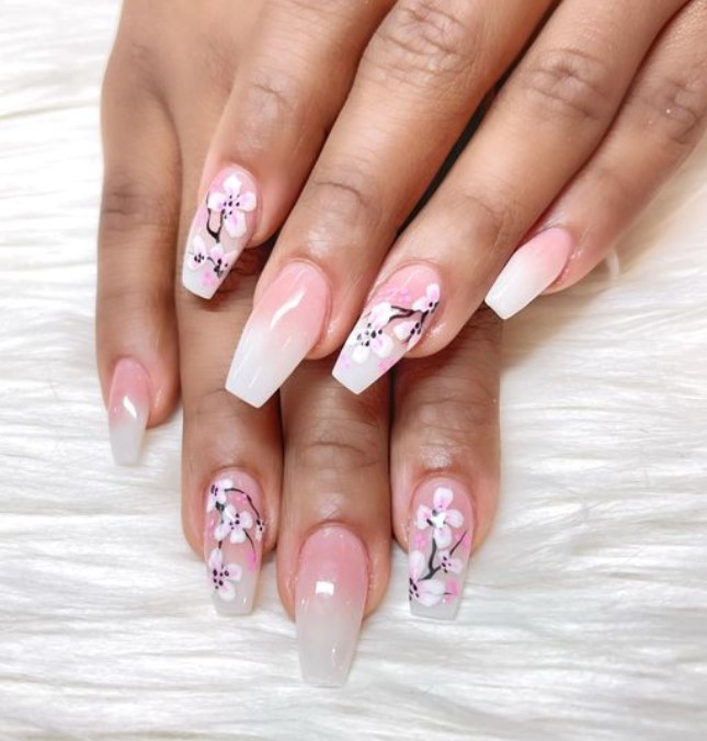 Pink pearl and ivory ombre nails.