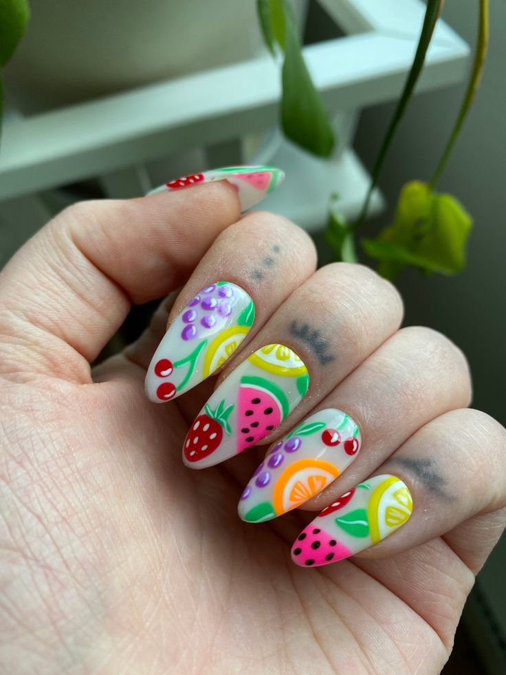 Vibrant and fruity nail art designs.