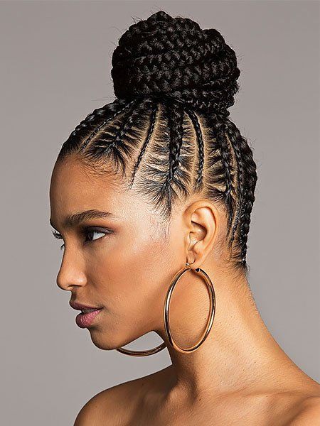 Updo hairstyle featuring a braided bun.