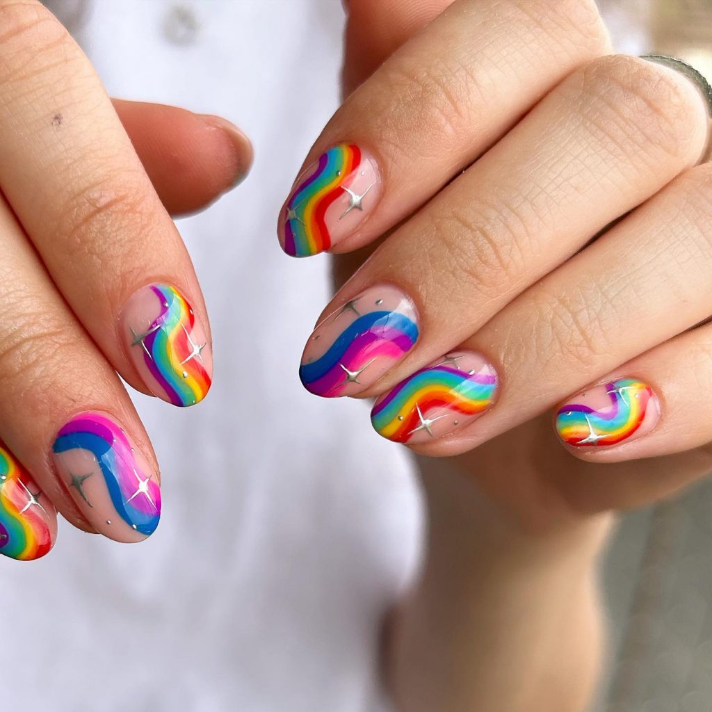 Glossy nails in pride-inspired colors.