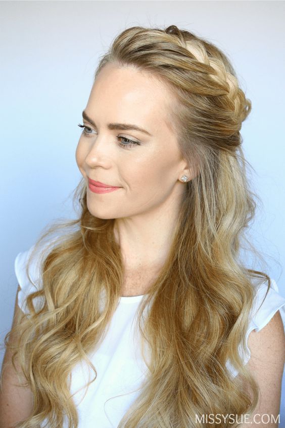 Boho-inspired half-up braided crown, ethereal grace.