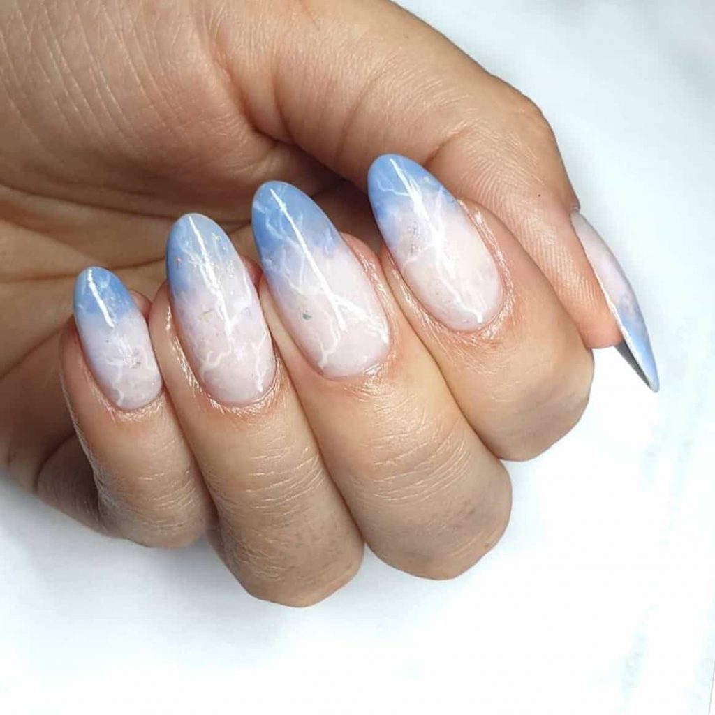 Gradient artistry on nails.