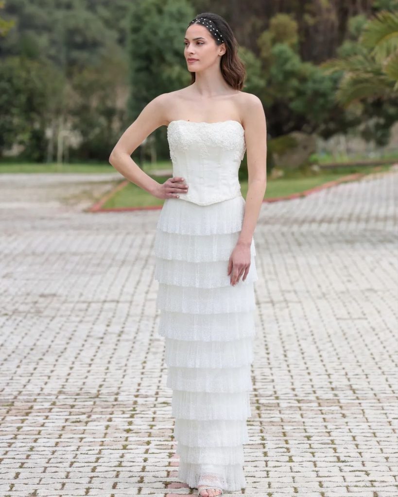 Ethereal layered bridal gown for captivating look.