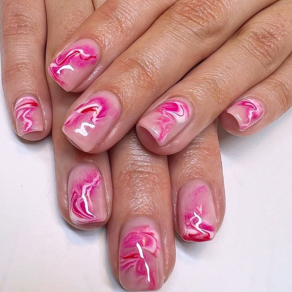 Romantic marble patterns in hues of pink.