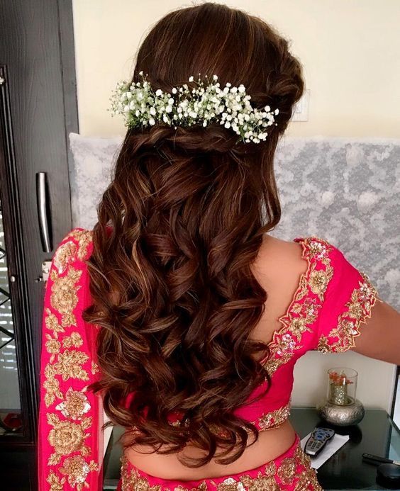 Loose curls with a flower accessory