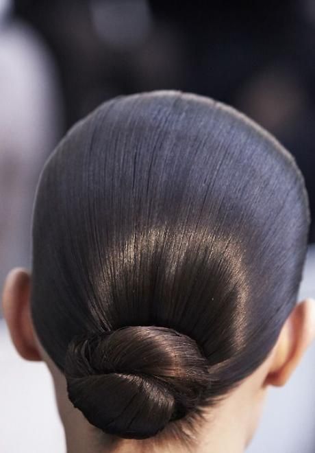 wedding guest hair look inspired sleek and polished chignon