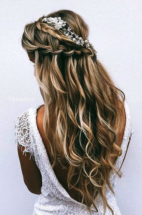 Intricate braids with cascading waterfall like curls.