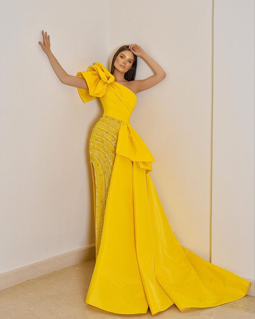 bright yellow-colored wedding guest gown
