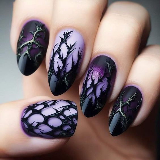 Purple sky with black vines in an evening-themed nail art.