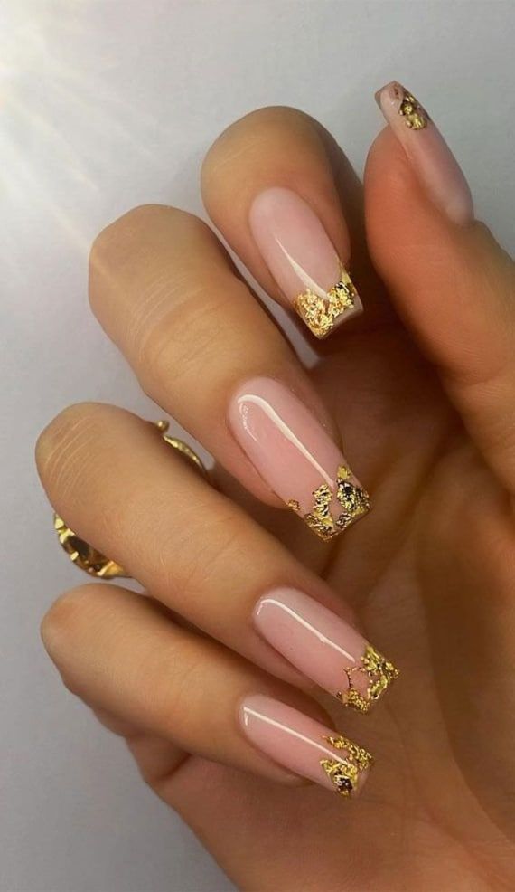 Gorgeous gold flaked tip with nude accents.