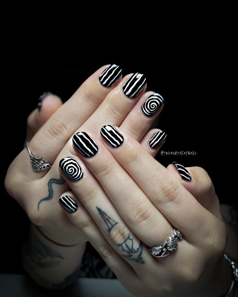 Black and white trippy with geometric lines.