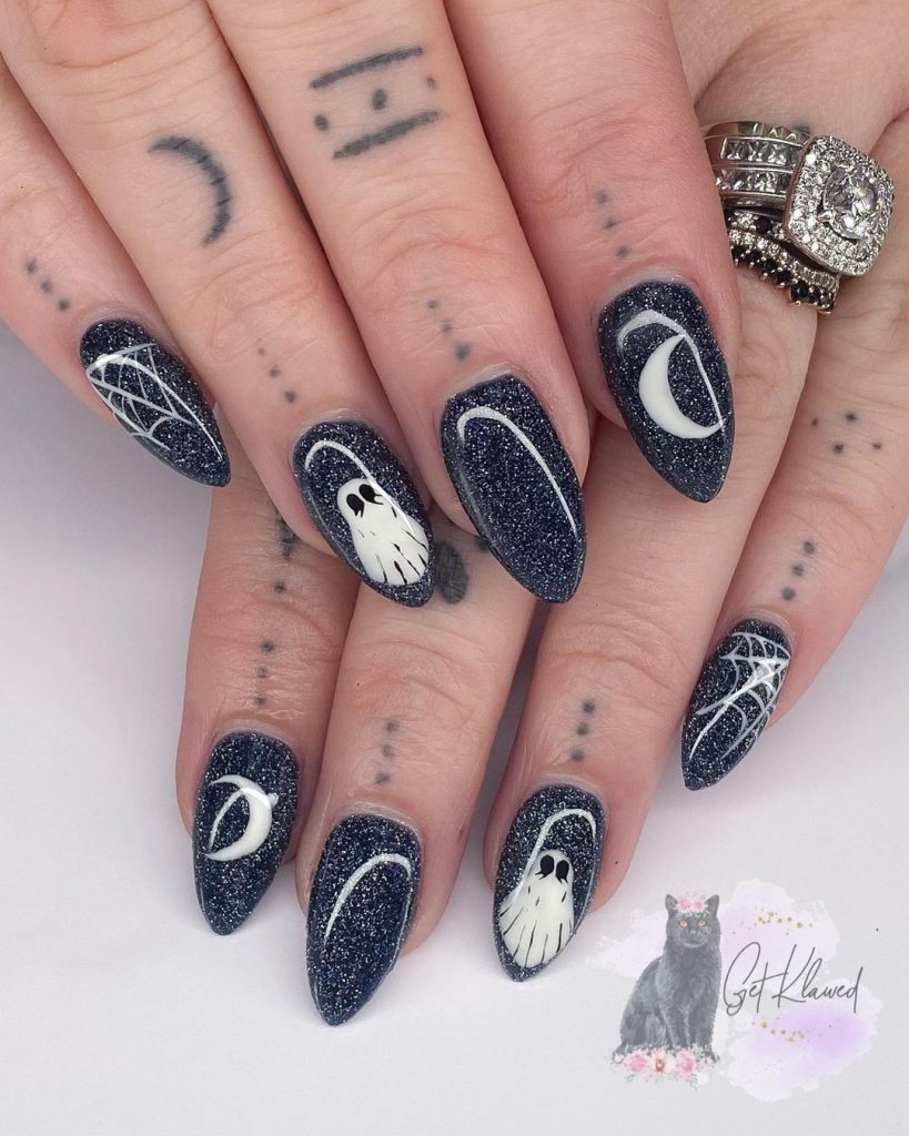 Black glittery with white ghost and cobweb accents.
