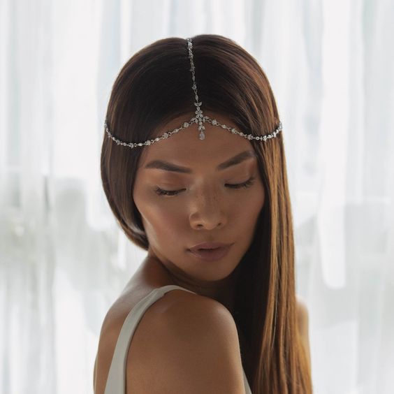 Straight hair with a delicate crystal headpiece