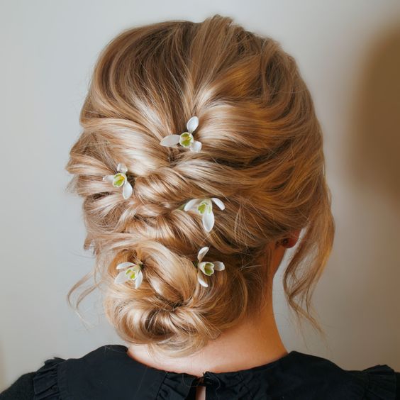 wedding guest hair look inspired romantic twisted updo
