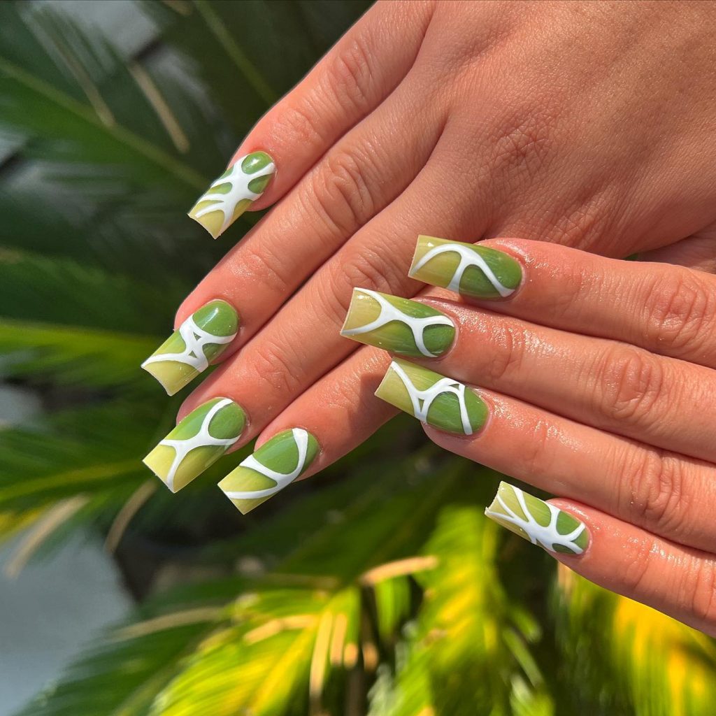 Olive and green ombre square nails.