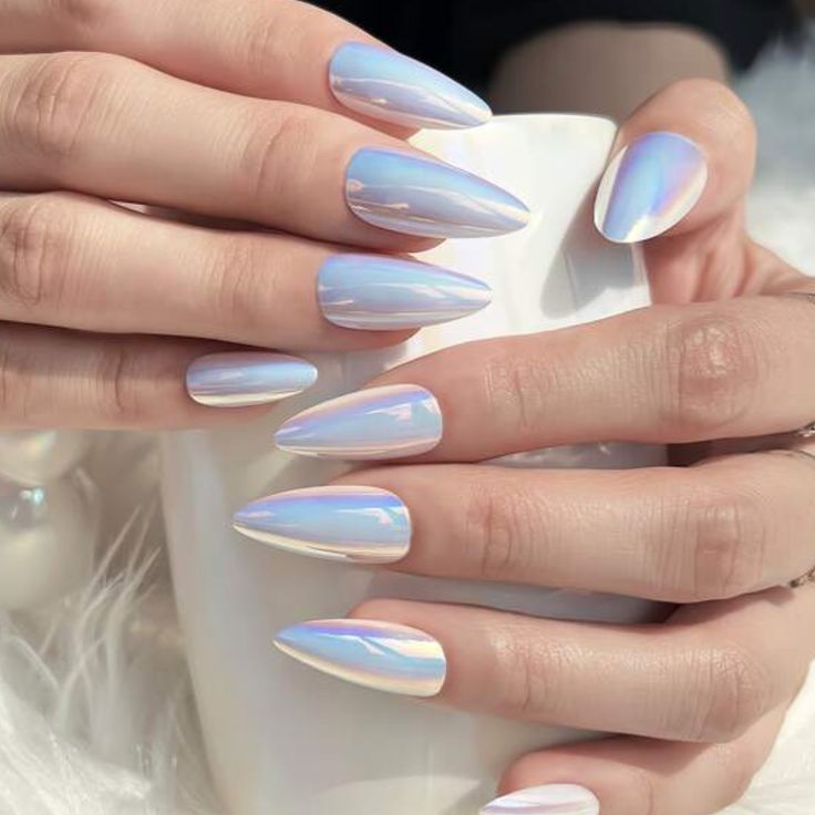 Shimmery almond nails with a mermaid gradient.