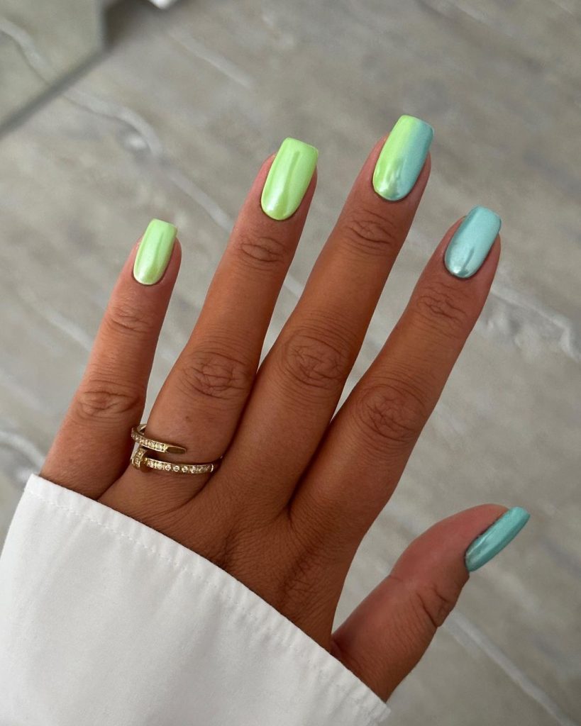 Square nails in pastel green and blue shades.