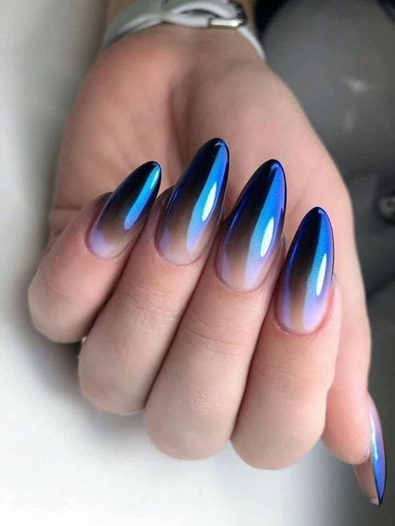 Royal blue ombre in almond shape.