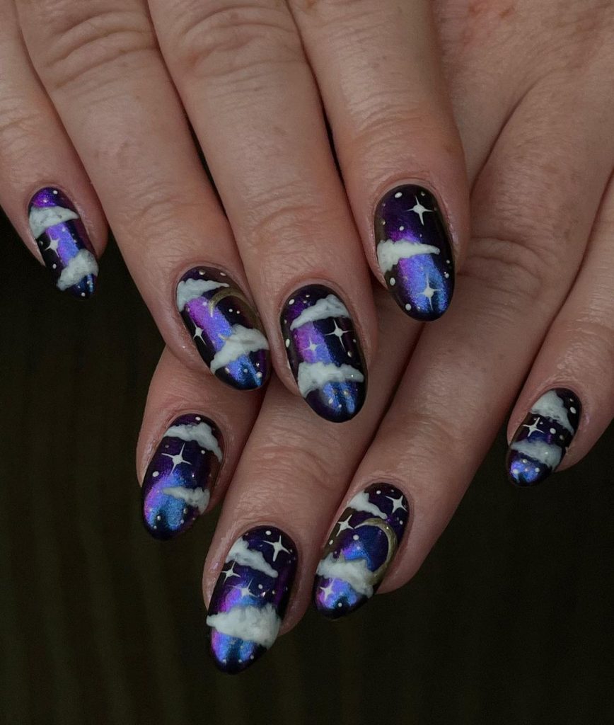 Ombre round nails with stars and clouds.