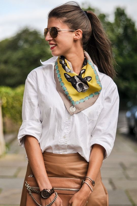 White shirt accessorized with a scarf.