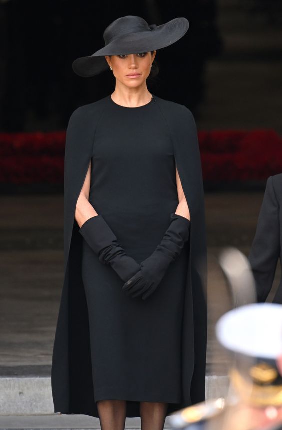 The Cape Sleeve Black Dress