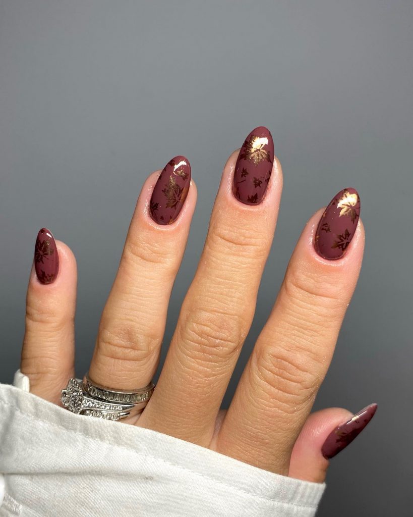 Elegant brown almond nails for a warm party style.