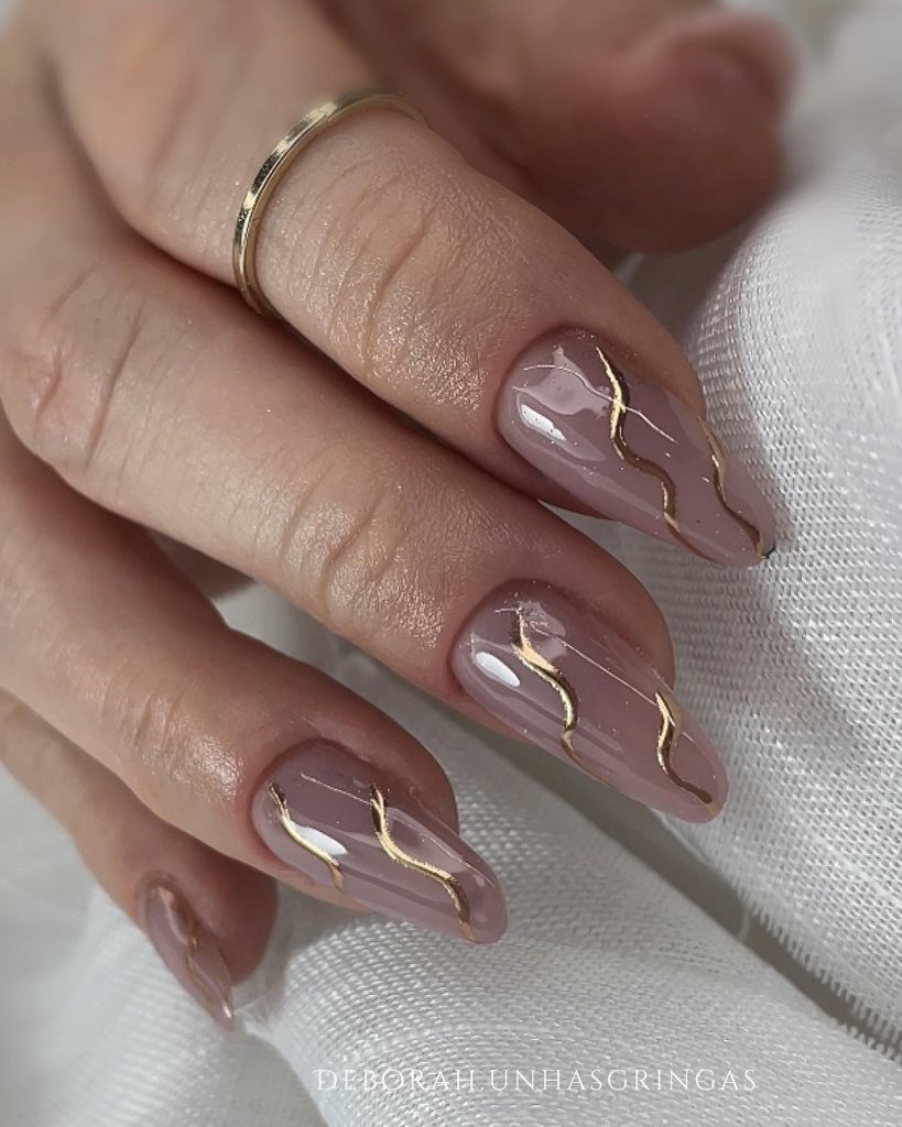 Clear almond with gold details.