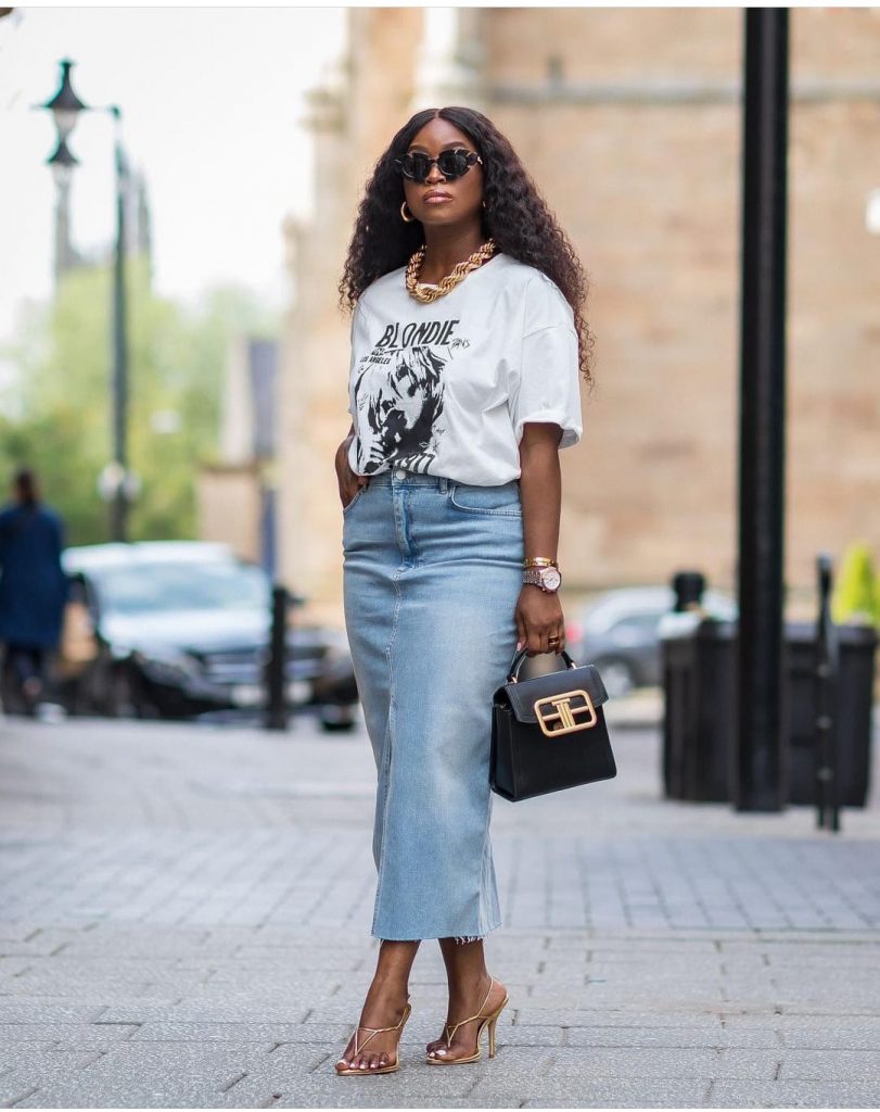 lady with denim maxi skirt and graphic tshirt