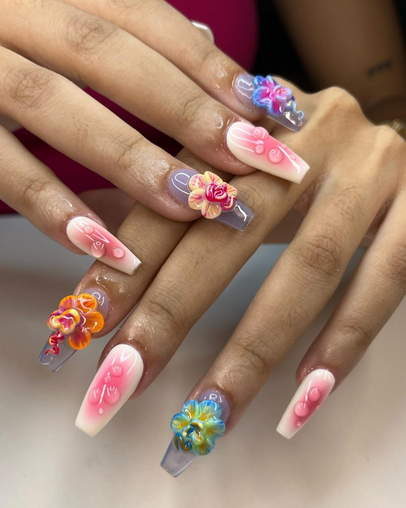 Colorful gel manicure with 3-D flowers.