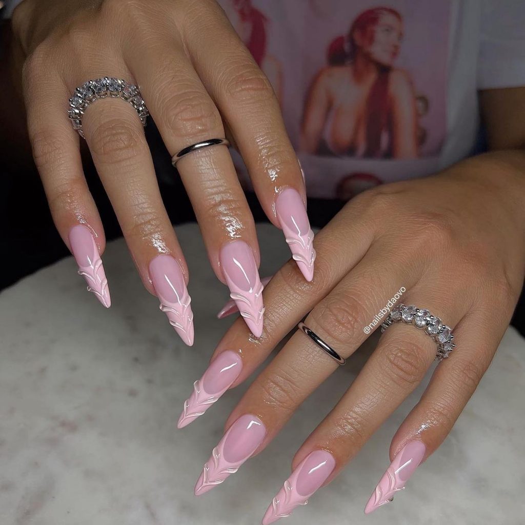 Blush pink almond grace on acrylic nails.