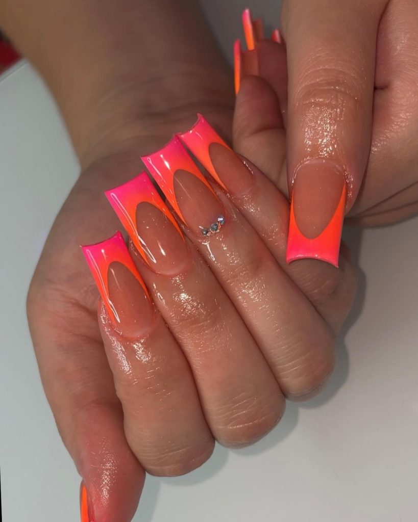 Chic and bold neon-colored French tip.