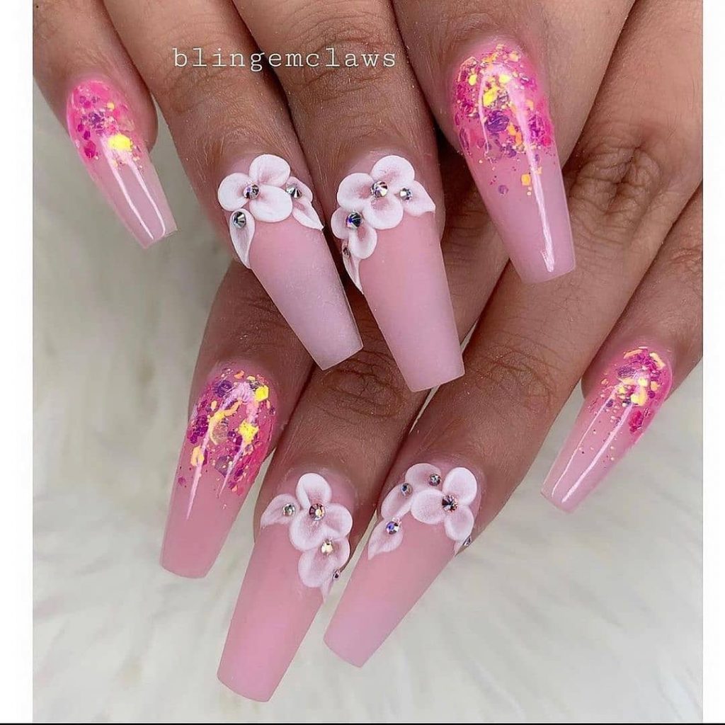 Pink floral waterfall on acrylic coffin nails.