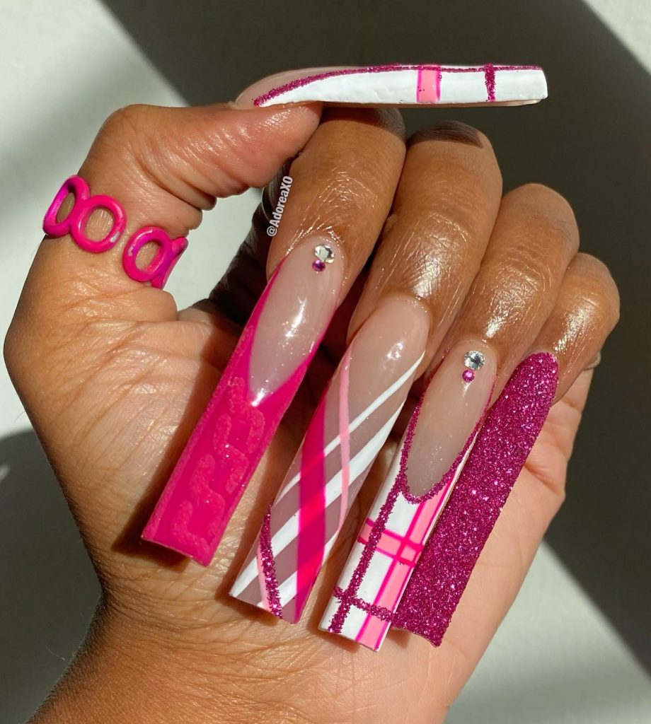 Playful pink plaid delight with acrylic nails.