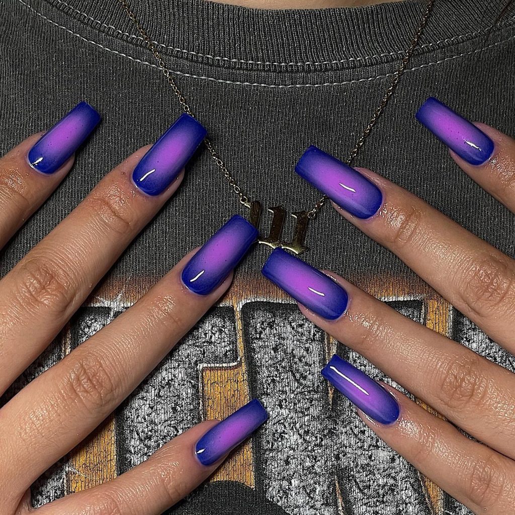 Ombre blending royal purple with soft pink.