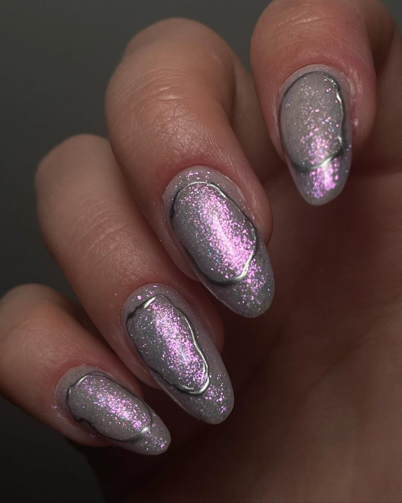 Radiant silver almond nails to shine at the party.