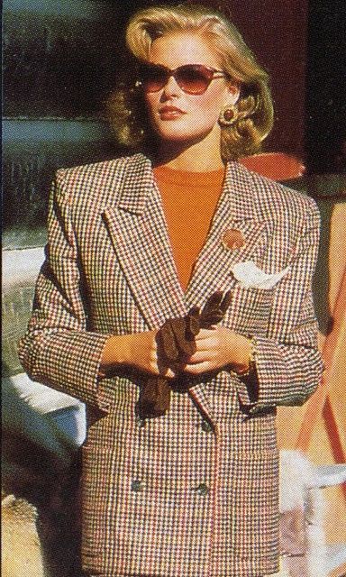Vintage checked blazer with orange round neckline blouse.