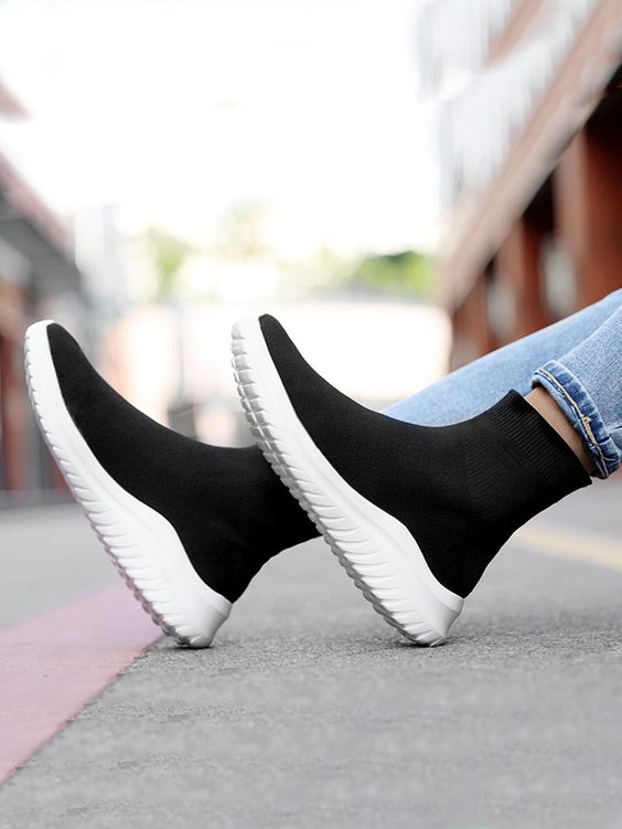 Trendy high-top knit slip-on sock sneakers.